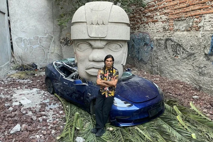 Mexican sculptor crushes Tesla with stone sculpture